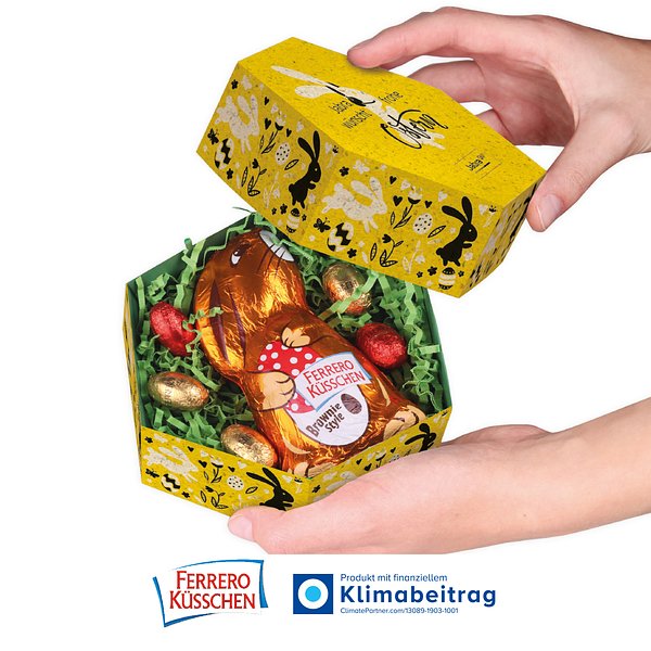 Grosses Osternest mit Schokolade von Ferrero Küsschen auf Graspapier