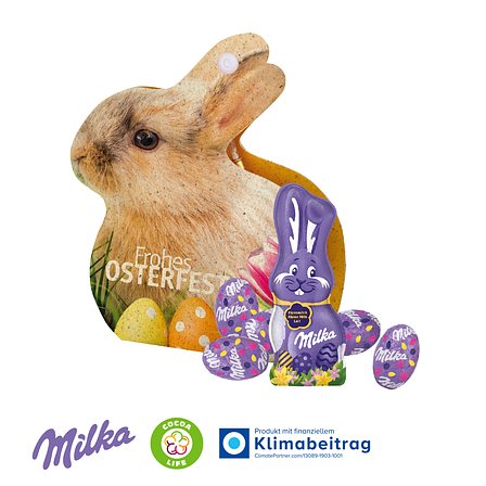 Werbe-Hase mit Milka Schokoladenmischung auf Graspapier