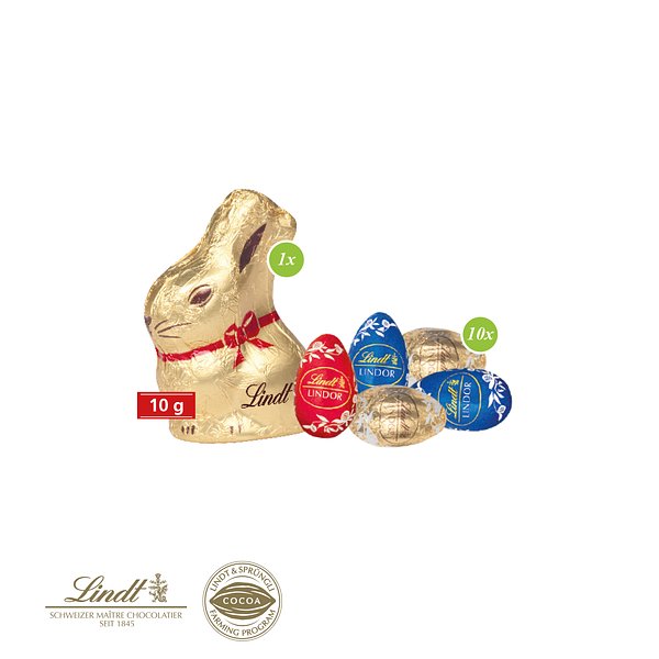 Werbe-Osterei mit Goldhase und Schoko-Eier von Lindt auf Graspapier