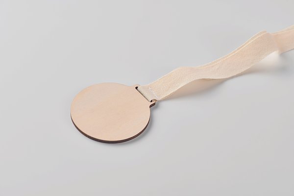 Medaille aus Holz Benep