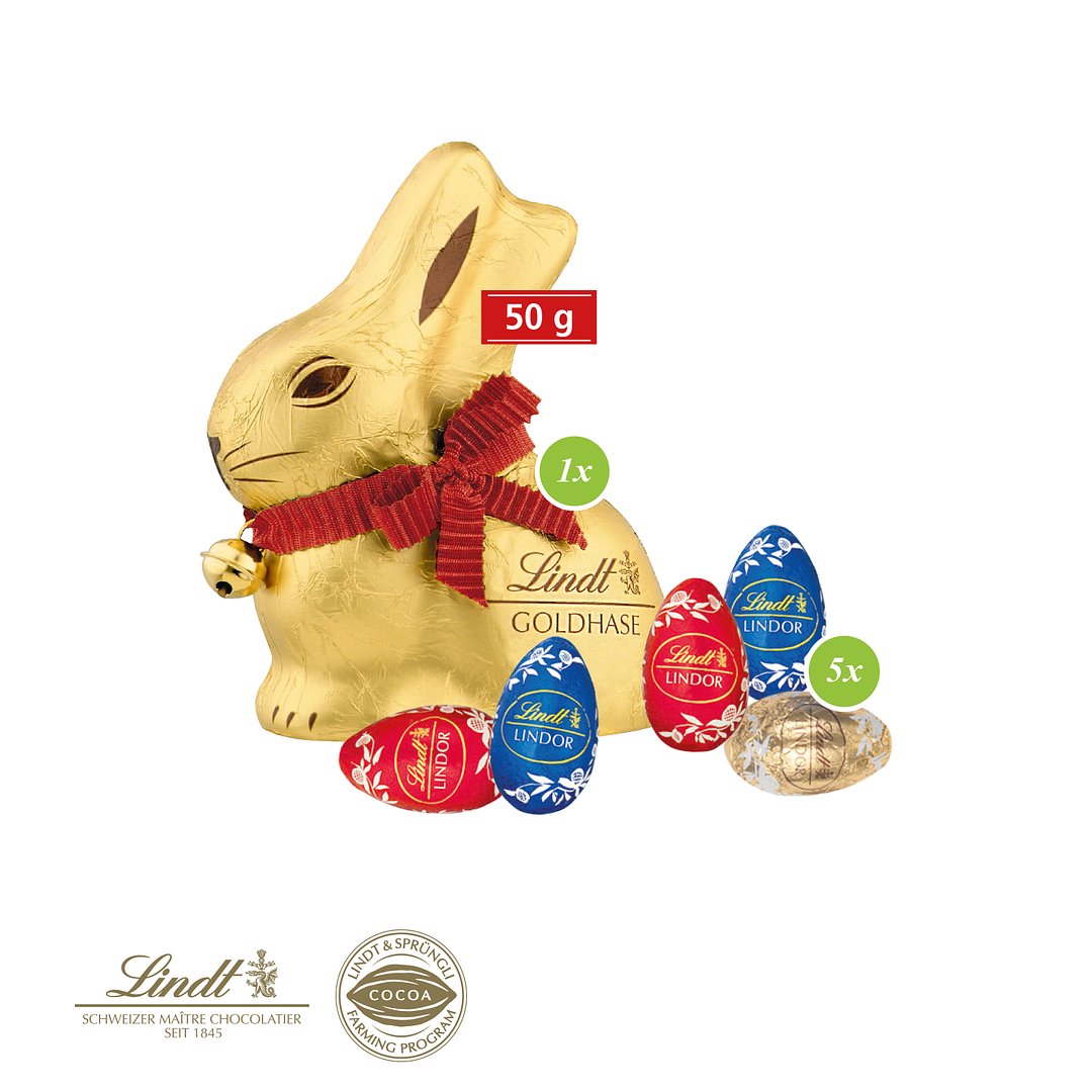 Grosses Osternest mit Schokolade von Lindt auf Graspapier