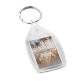 Schlüsselanhänger aus PS. Dieser ist transparent und rechteckig Inandy