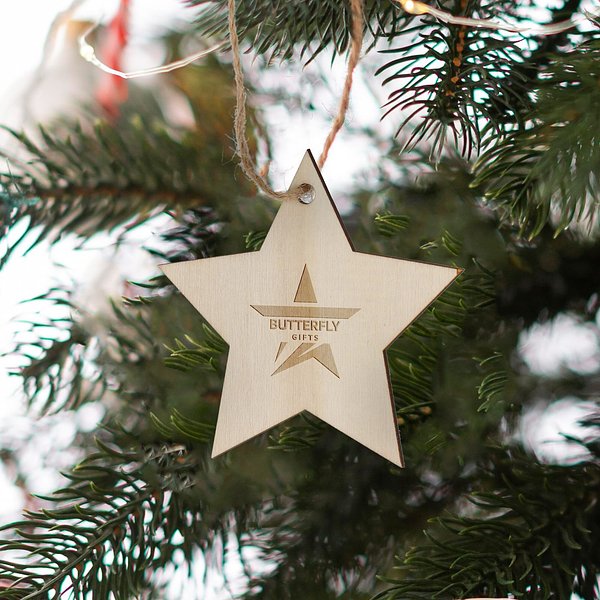Sternförmiges Weihnachtsornament aus Holz Lüta